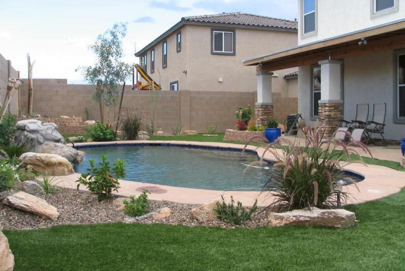 Artificial Turf Landscape surrounding swimming pool